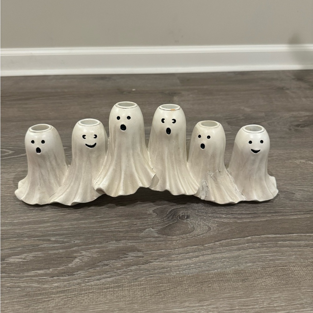 damaged and repaired resin ghost candelabra. Priced according to condition.